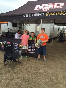Ronnie signing autographs for young fans