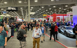 SEMA show booth and visitors